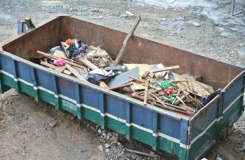 Construction site with accumulated waste in Muswell Hill